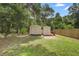 Backyard featuring two storage sheds with ample space for tools and equipment at 244 N Leavitt Ave, Orange City, FL 32763
