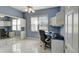 Bright and clean office space featuring tile floor, large window and built in shelves at 2500 Castle Pines St, Clermont, FL 34711
