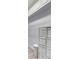Walk-in closet features built-in shelves and wood-look floors at 2500 Castle Pines St, Clermont, FL 34711