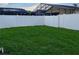 Spacious backyard with lush green grass and privacy fence, perfect for outdoor activities at 2765 Montego Bay Blvd, Kissimmee, FL 34746