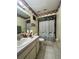 Bathroom with a vanity, toilet, and shower at 2765 Montego Bay Blvd, Kissimmee, FL 34746