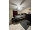 Bedroom with a ceiling fan and tiled flooring at 2765 Montego Bay Blvd, Kissimmee, FL 34746