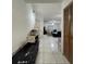 Inviting entryway featuring tile flooring leading into a living area at 2765 Montego Bay Blvd, Kissimmee, FL 34746