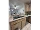 Functional kitchen equipped with stainless steel sink, countertops, and ample cabinet space at 2765 Montego Bay Blvd, Kissimmee, FL 34746