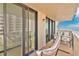 Enjoy ocean views from this relaxing balcony with comfortable seating and a cozy hammock at 2947 S Atlantic Ave # 601, Daytona Beach, FL 32118
