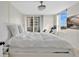 Cozy bedroom featuring a comfortable bed, beach views, and a modern stationary bicycle at 2947 S Atlantic Ave # 601, Daytona Beach, FL 32118