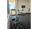Resident gym with weights, treadmill, rowing machine, and punching bag at 2947 S Atlantic Ave # 601, Daytona Beach, FL 32118