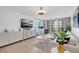 Bright living room featuring contemporary furnishings, ocean views, and a convenient workspace at 2947 S Atlantic Ave # 601, Daytona Beach, FL 32118