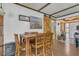 Cozy dining room with wood-look floors and views of the living area at 2990 E Central Ave, Bartow, FL 33830