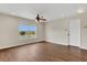 Bedroom featuring wood floors and a view of the lake in the window at 3009 Park Ridge Ave, Mulberry, FL 33860