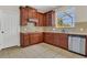 Functional kitchen with tiled backsplash, ample storage, and modern appliances at 3009 Park Ridge Ave, Mulberry, FL 33860
