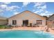 Backyard pool featuring a patio and view of the home's rear exterior at 3280 Pinto Dr, Kissimmee, FL 34746