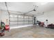 Attached garage featuring garage door and ample open space at 3280 Pinto Dr, Kissimmee, FL 34746