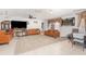 Spacious living room with tile floors, ceiling fan, comfortable sofas, and lots of natural light at 3280 Pinto Dr, Kissimmee, FL 34746