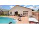 Backyard pool featuring a patio and view of the home's rear exterior at 3280 Pinto Dr, Kissimmee, FL 34746