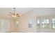 Bright and airy bedroom with vaulted ceilings and access to the patio at 33042 Lake Bend Cir, Leesburg, FL 34788
