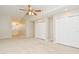 Spacious bedroom with large closets and ceiling fan at 33042 Lake Bend Cir, Leesburg, FL 34788