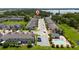 Overhead view of neighborhood with community pool, lush green spaces and manicured lawns at 3508 Brighton Park Cir, Belle Isle, FL 32812