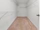 Walk-in closet with carpeted floor and shelving at 3508 Brighton Park Cir, Belle Isle, FL 32812