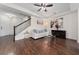 Comfortable living room with hardwood floors, modern decor, and staircase at 3508 Brighton Park Cir, Belle Isle, FL 32812