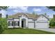 Charming single-story home with a well-maintained lawn and a two-car garage at 351 S Sunset Ave, Mascotte, FL 34753
