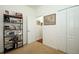 Bedroom view showcasing a bookshelf and access to another bedroom through an open doorway with a large closet at 3574 La Jolla Dr, Clermont, FL 34711