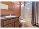 Well-lit bathroom featuring a shower-tub combo, updated vanity and neutral tones for a clean and functional space at 3637 Foxchase Dr, Clermont, FL 34711