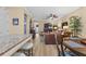 Inviting living room with hardwood floors, open layout, and stylish decor at 366 Reed Grass Dr, Oviedo, FL 32765