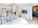 Bright bedroom with walk-in closet, neutral colors, and easy access to the bathroom at 378 Cape Honeysuckle Pl, Sanford, FL 32771