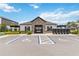 Community clubhouse featuring stone accents and convenient parking at 378 Cape Honeysuckle Pl, Sanford, FL 32771