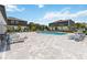 Community pool with lounge chairs and well-manicured landscaping at 378 Cape Honeysuckle Pl, Sanford, FL 32771