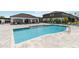 Community pool featuring seating, lounging, and steps into pool at 378 Cape Honeysuckle Pl, Sanford, FL 32771