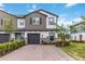 Charming two-story home with a two-car garage and a brick driveway at 378 Cape Honeysuckle Pl, Sanford, FL 32771