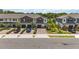 Beautifully maintained townhomes with brick driveways and lovely landscaping at 378 Cape Honeysuckle Pl, Sanford, FL 32771
