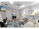 Bonus room features a TV, fan, multiple skylights, and comfortable seating at 4048 Gilder Rose Pl, Winter Park, FL 32792