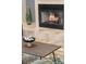Cozy fireplace with a stone surround, creating a warm and inviting atmosphere at 4048 Gilder Rose Pl, Winter Park, FL 32792