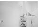 Bright bathroom featuring a pedestal sink, large mirror and neutral decor at 4432 Desert Rose Ave, Kissimmee, FL 34746