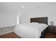 Spacious bedroom featuring wood floors, a decorative rug, and a Queen size bed at 4432 Desert Rose Ave, Kissimmee, FL 34746