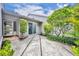 Lovely villa with well maintained landscaping, patio, and beautiful trees at 463 Warrenton Rd # 463, Winter Park, FL 32792