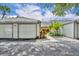 Charming villa featuring a well-maintained exterior and two-car garage at 463 Warrenton Rd # 463, Winter Park, FL 32792