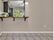 Kitchenette area features a breakfast bar and view to the outside at 463 Warrenton Rd # 463, Winter Park, FL 32792