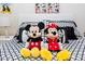 This bedroom features Mickey and Minnie Mouse stuffed animals and decor at 4912 Windermere Ave, Kissimmee, FL 34746