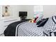 This bedroom features white dresser, TV, and decorative Minnie Mouse accents at 4912 Windermere Ave, Kissimmee, FL 34746