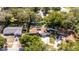 Aerial view of a home featuring a deck, solar panels, and a well-maintained yard at 5177 Chesapeake Ave, Orlando, FL 32808
