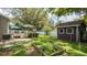 Beautiful backyard with a deck and shed; ideal for gardening and outdoor activities at 5177 Chesapeake Ave, Orlando, FL 32808