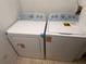 Brand new white Whirlpool washer and dryer set with EnergyGuide label at 5459 Vineland Rd # 4310, Orlando, FL 32811