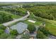 Aerial view showcasing recreation area with tennis court, volleyball and playground at 5512 Metrowest Blvd # 201, Orlando, FL 32811