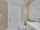 Clean bathroom features white tile and modern fixtures at 5512 Metrowest Blvd # 201, Orlando, FL 32811