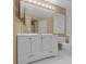 Bathroom with updated vanity and white tiled floor at 5512 Metrowest Blvd # 201, Orlando, FL 32811