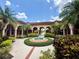 Well-maintained courtyard with manicured landscaping at 5512 Metrowest Blvd # 201, Orlando, FL 32811